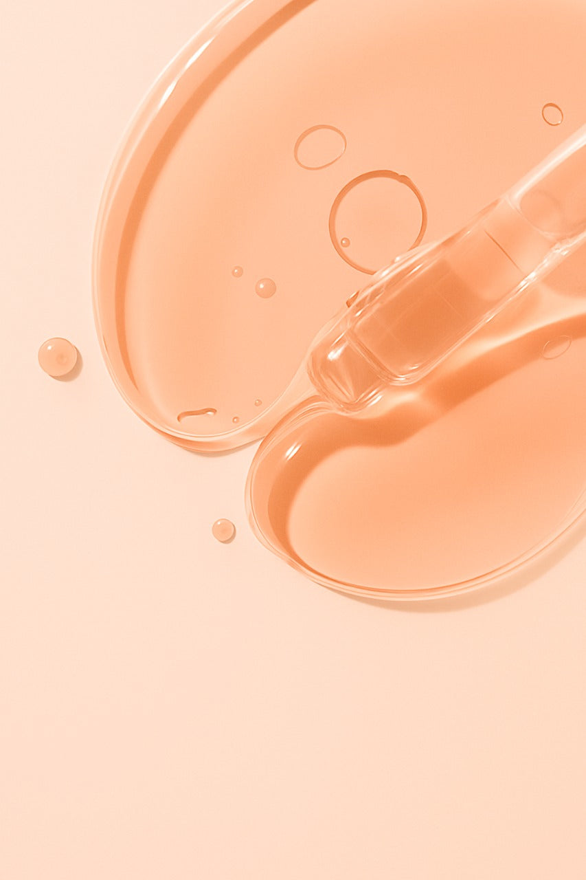 Hydrating skincare serum texture with dropper — GlowWithROI clean beauty product